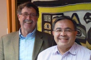 Sealaska VP Rick Harris and CEO Chris McNeil pose at the corporatin's board room. (Ed Schoenfeld/CoastAlaska)
