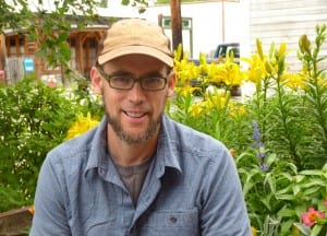 Gitanyow Fisheries Authority Fish and Wildlife Biologist Kevin Koch talks about mine impacts in a small park in Old Hazelton, B.C. (Ed Schoenfeld, CoastAlaska News)