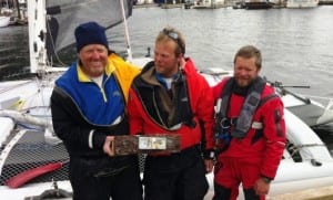 Al Hughes, Matt Steverson and Graeme Esarey take first-place in the Race To Alaska. The crew crossed the finish line in Ketchikan, Alaska at 12:55pm on Friday, June 12, 2015. (KRBD File Photo)