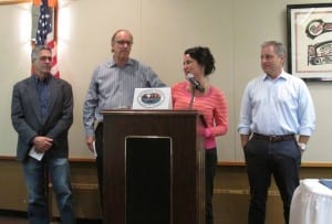 Sen. Lesil McGuire speaks during the special Ketchikan Chamber of Commerce event on Monday, just before Gov. Sean Parnell, right, signed SB99 into law.