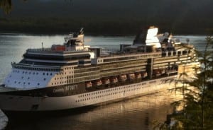 The cruise ship Infinity is seen leaving Ketchikan's Berth 4 about two weeks after it hit and damaged downtown's Berth 3. A slight dent in the side of the ship shows where it hit the dock. (Photo by Leila Kheiry)